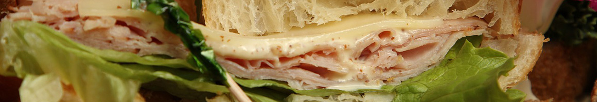 Eating Sandwich at Cornucopia Foods restaurant in Malden, MA.